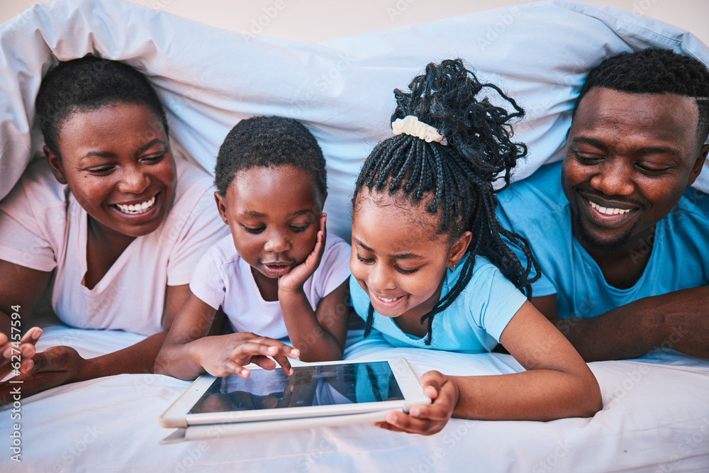 Happy, black family and tablet in bed for cartoon, learning or streaming a movie together. Education