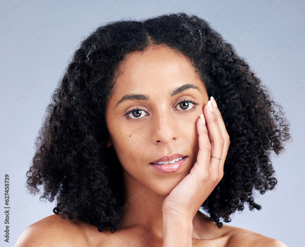 Portrait, hair and beauty with a model woman in studio on a gray background for skincare. Face, aest