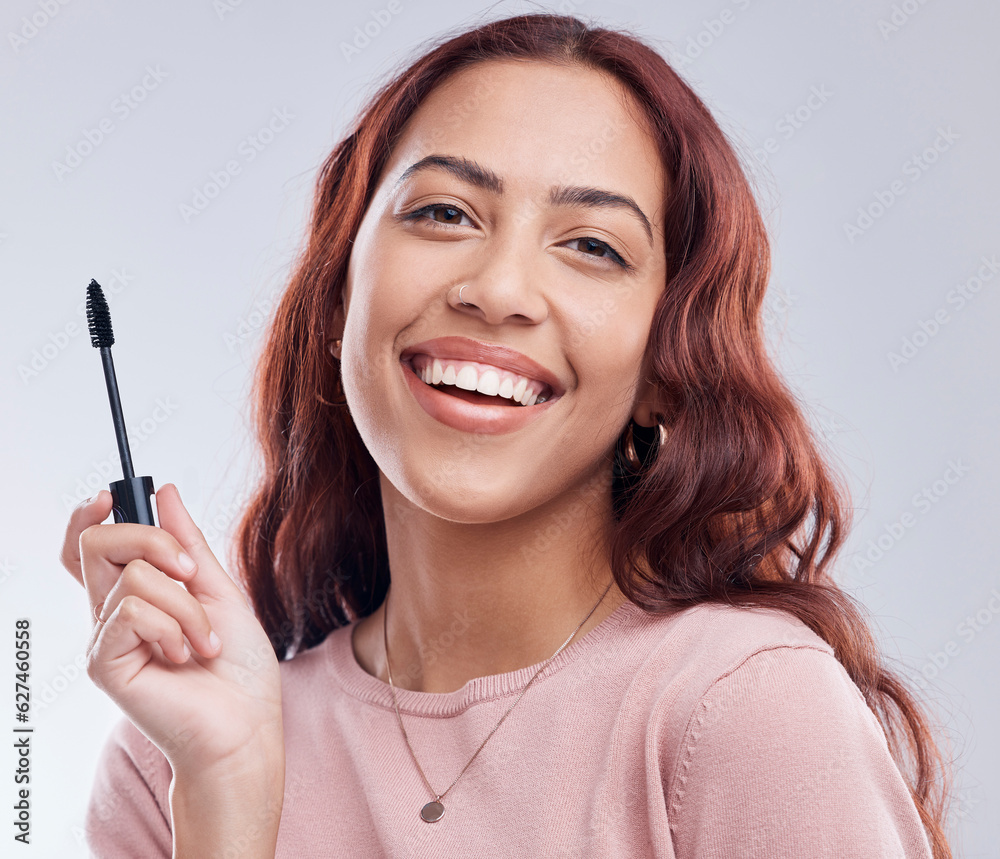 Portrait, beauty or happy girl with mascara makeup, cosmetics or product brush laughing in studio. S