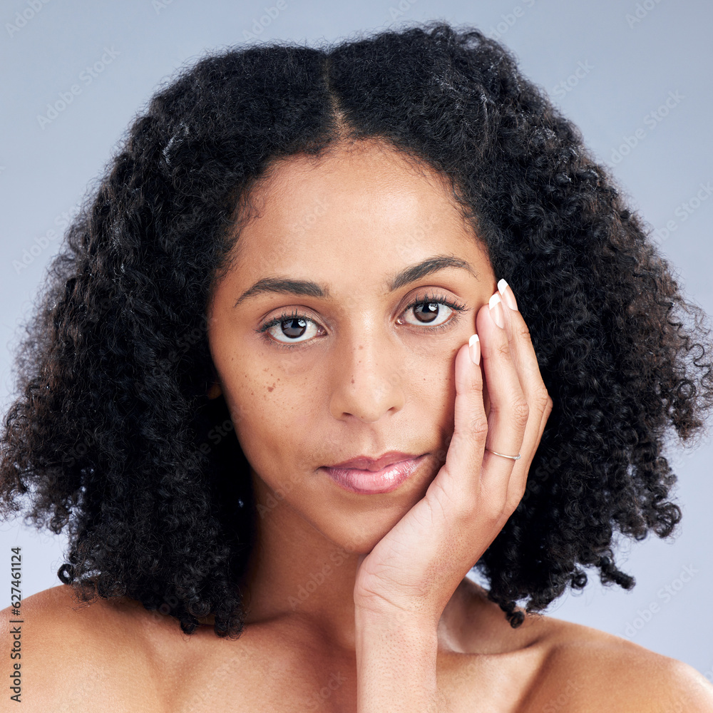 Portrait, beauty and natural with a model woman in studio on a gray background for skincare. Face, a