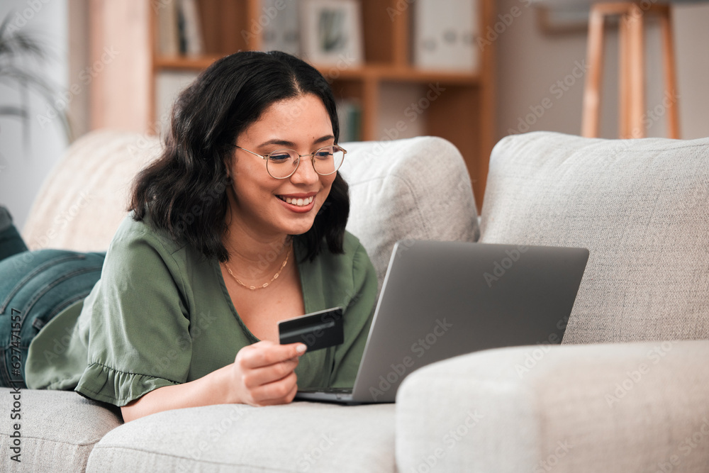 Credit card, laptop and woman for home online shopping, e learning and fintech payment on sofa. Rela