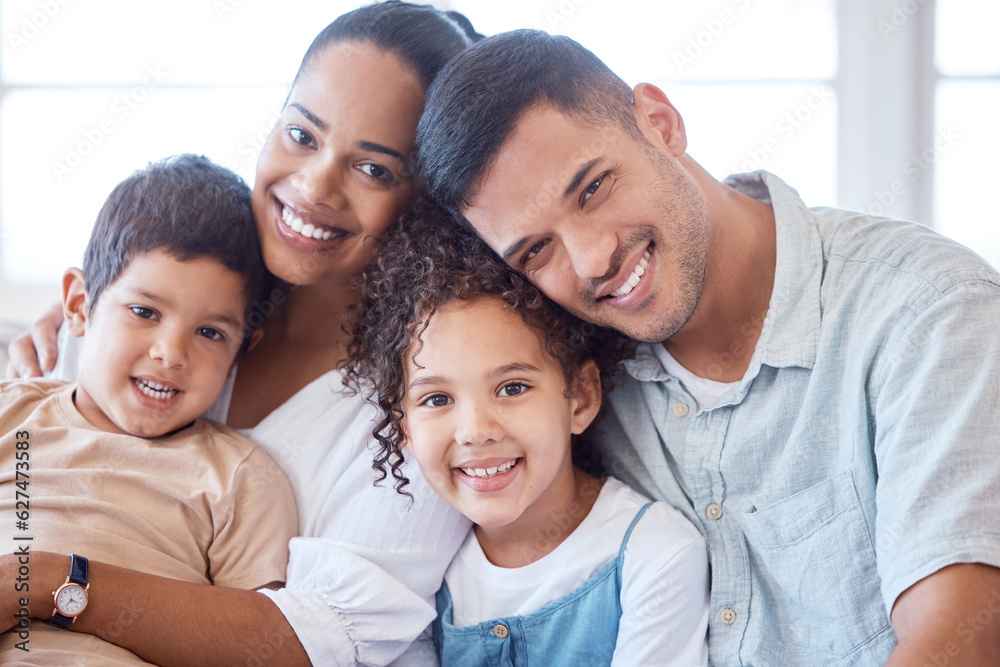 Parents, kids and portrait on couch with smile, hug and together with support, love and care in loun