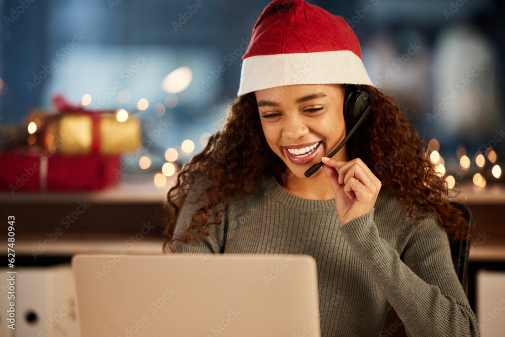 Christmas hat, call center and female agent working overtime in office at night in festive. Laptop, 