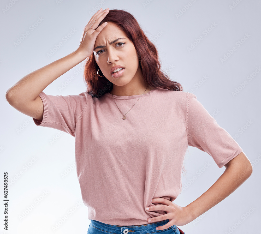 Regret, mistake and young woman in studio with hand on head for anxiety, stress or panic. Portrait o