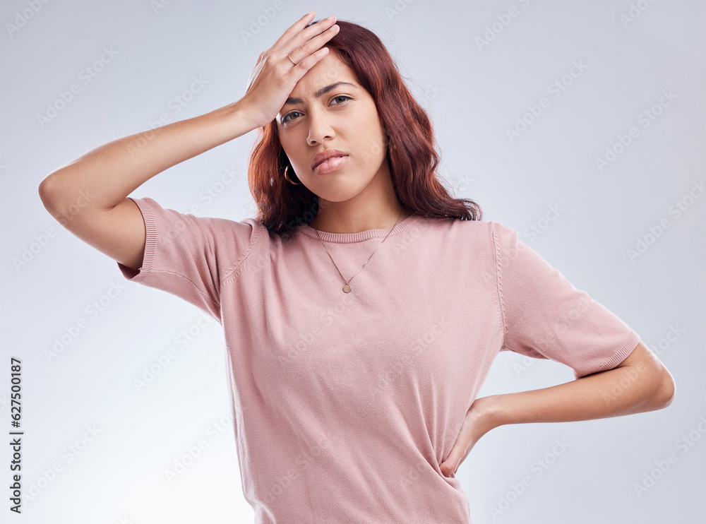 Mistake, regret and young woman in studio with hand on head for anxiety, stress or panic. Portrait o