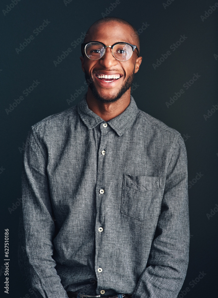 Feel what you want to feel. Studio shot of a handsome young man against a dark background.