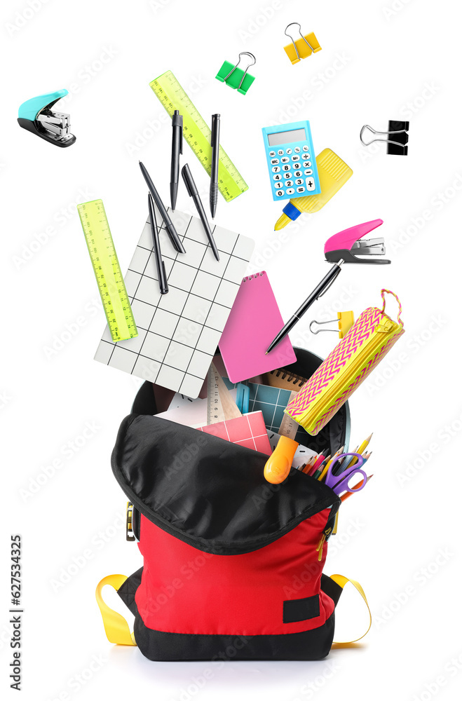 School backpack and stationery on white background