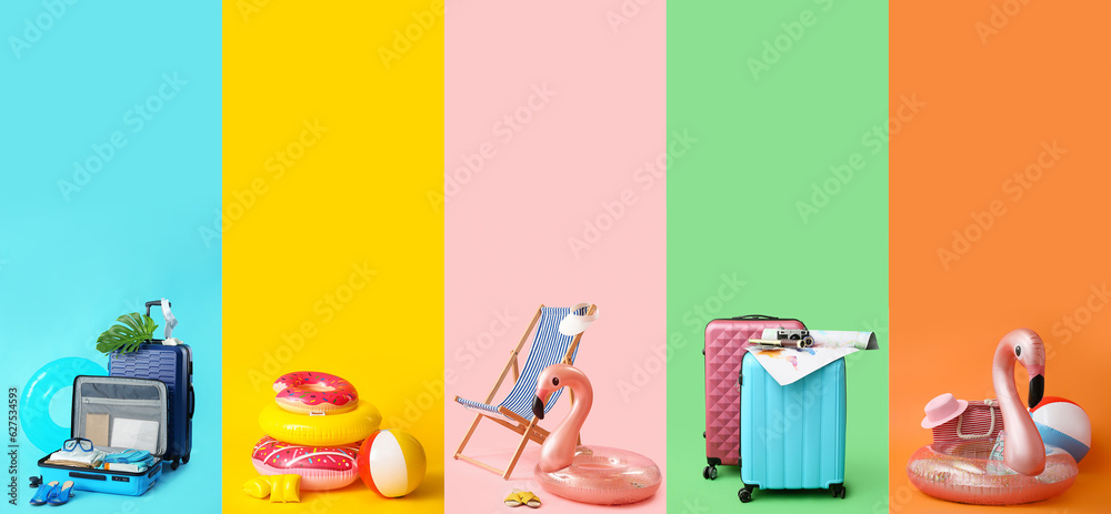 Group of beach accessories with packed suitcases on color background