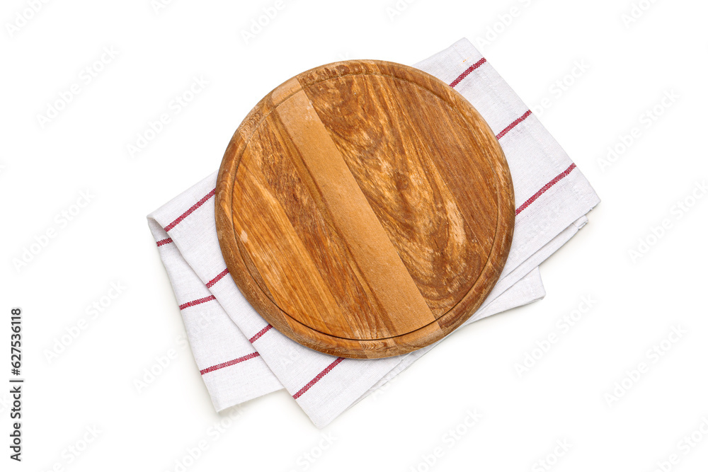 Round wooden board and napkin on white background