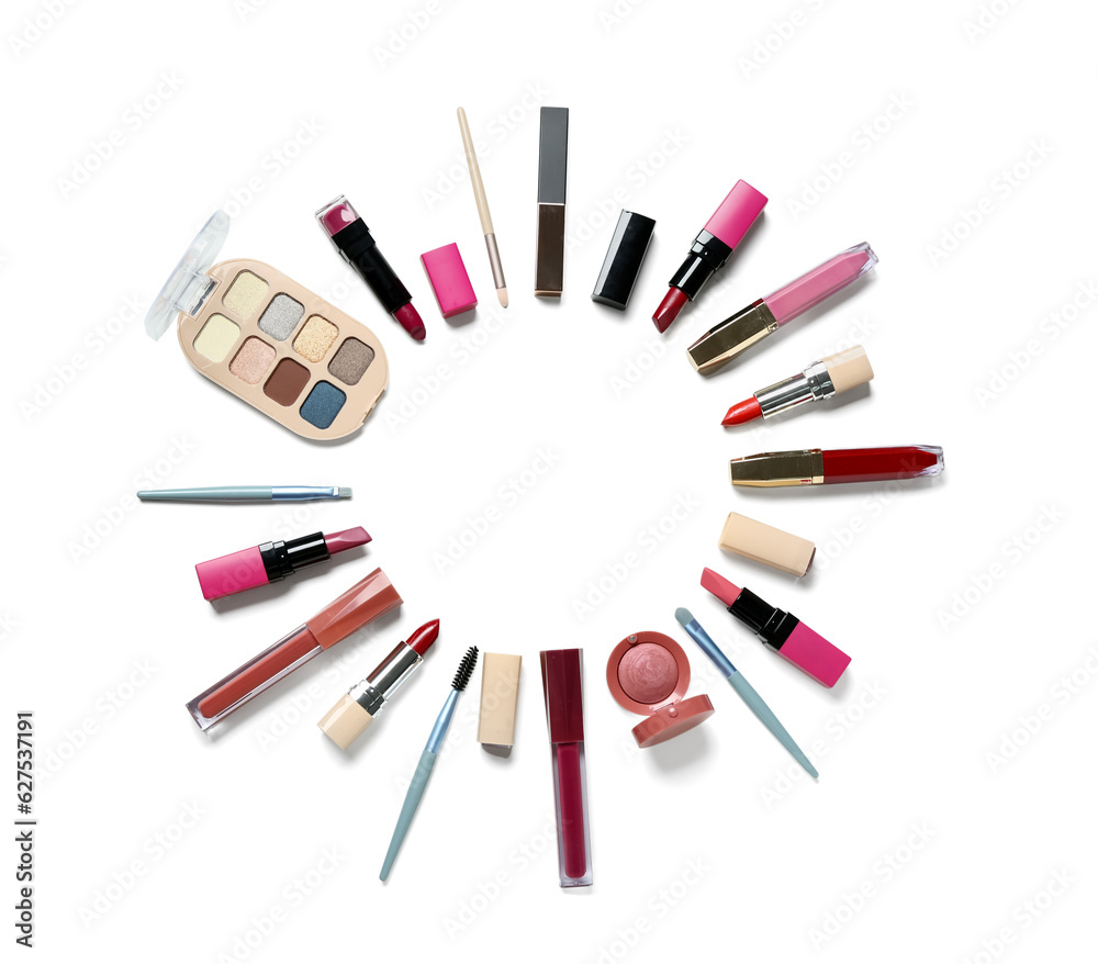 Frame made of different decorative cosmetics on white background