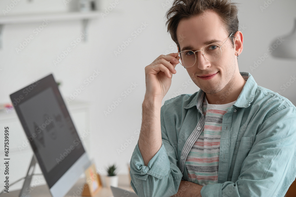 Portrait of male graphic designer in office