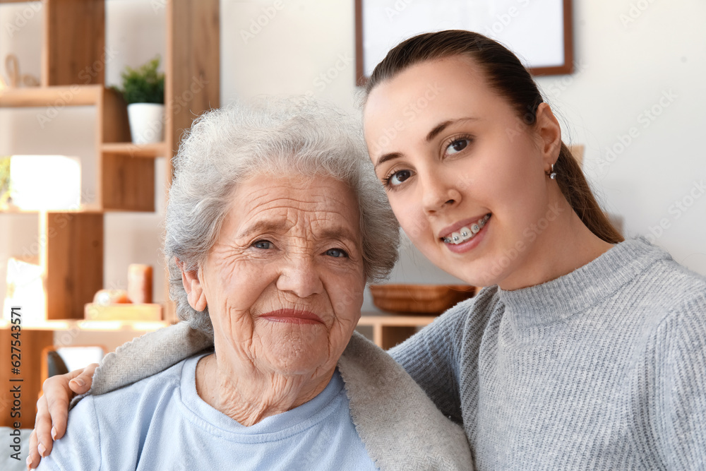 Senior woman with her granddaughter at home, closeup