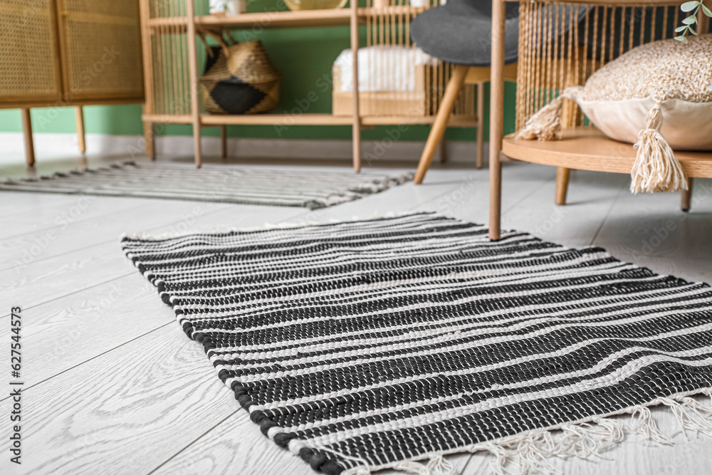 Soft rug on floor in living room, closeup