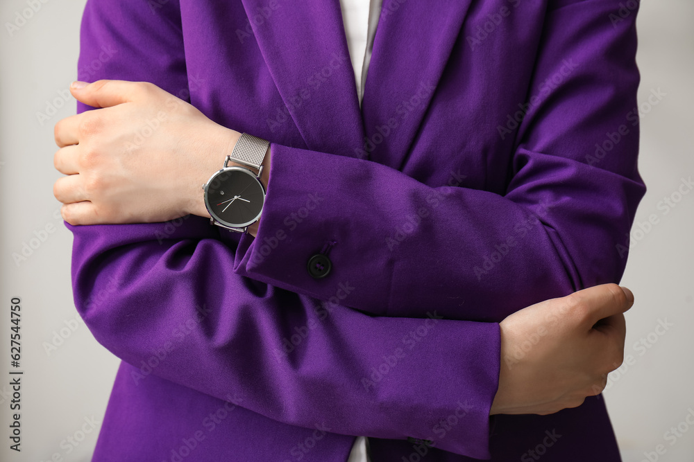 Young woman with stylish wristwatch, closeup