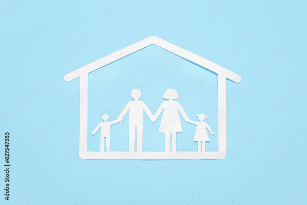 Figures of family with house on blue background