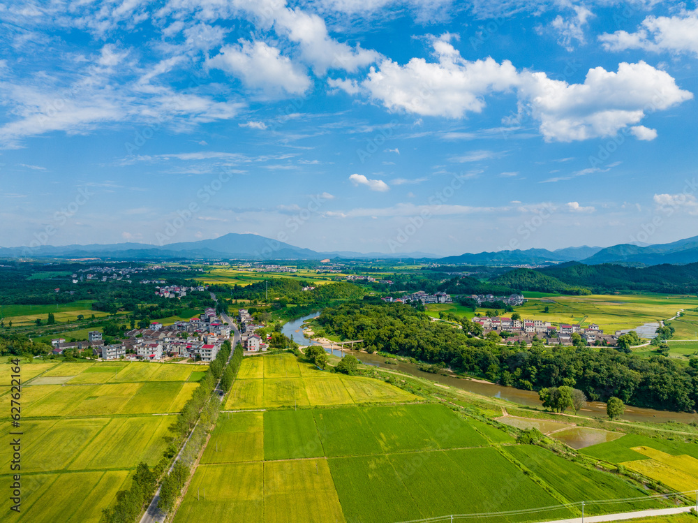 Overlook of Chinese rural houses and river scenery