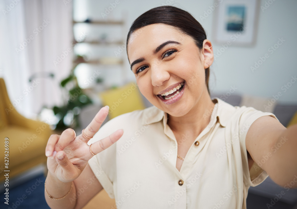 Face of woman, portrait and peace for selfie in home, video call and live streaming vlog in living r