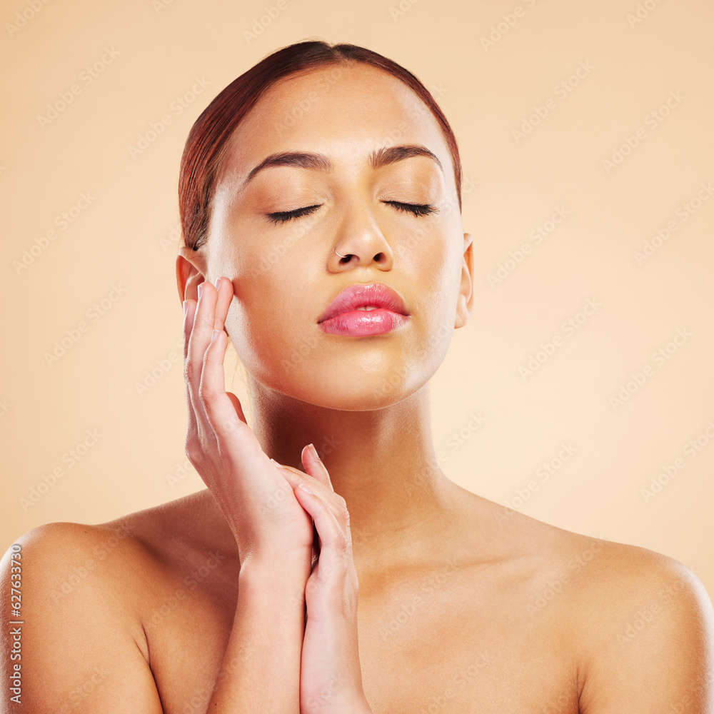 Touching face, skincare and woman with eyes closed in studio isolated on a brown background. Beauty,