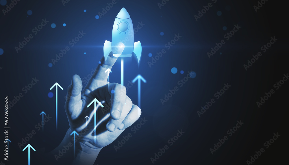 Close up of business man hand pointing at glowing flying blue rocket on dark background with mock up