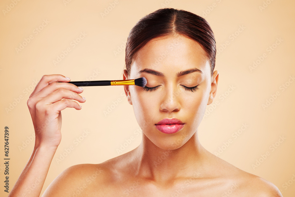 Makeup, brush and woman with cosmetic beauty product application for skincare isolated in a studio b