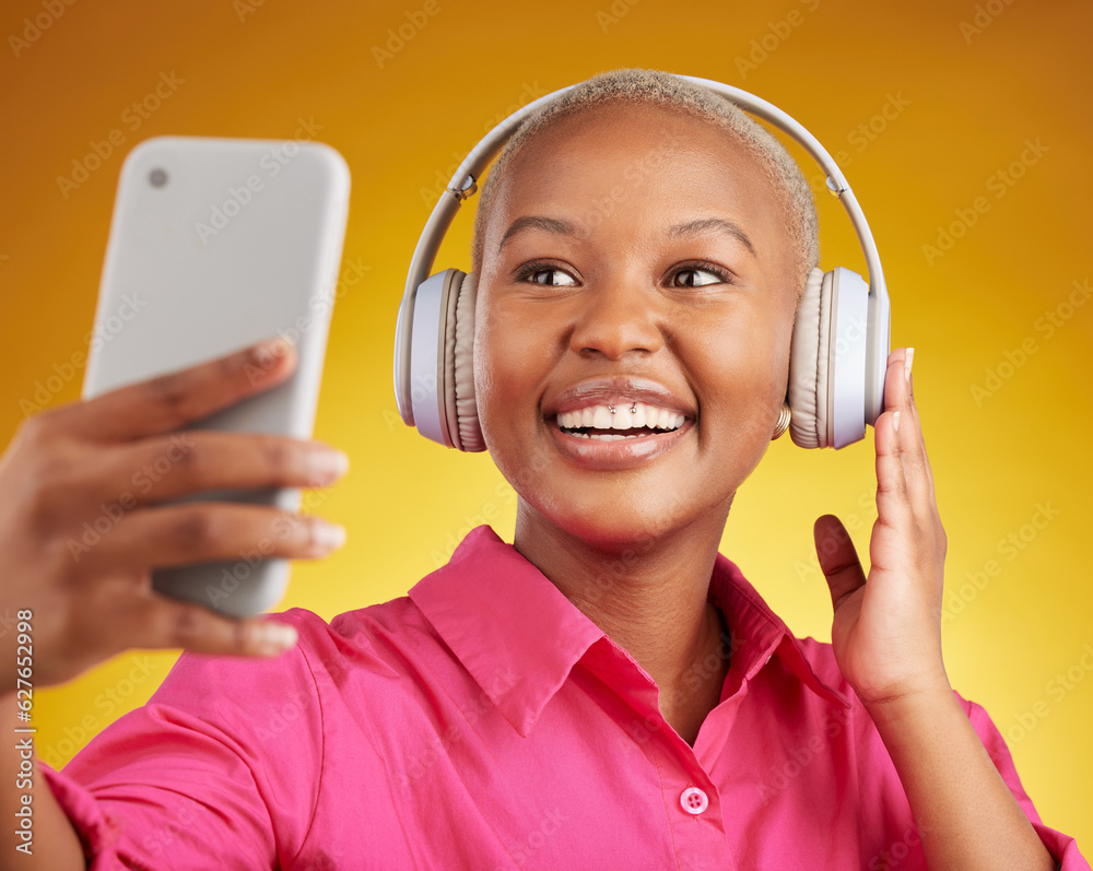 Selfie, smile and black woman with music headphones in studio, streaming or subscription on yellow b