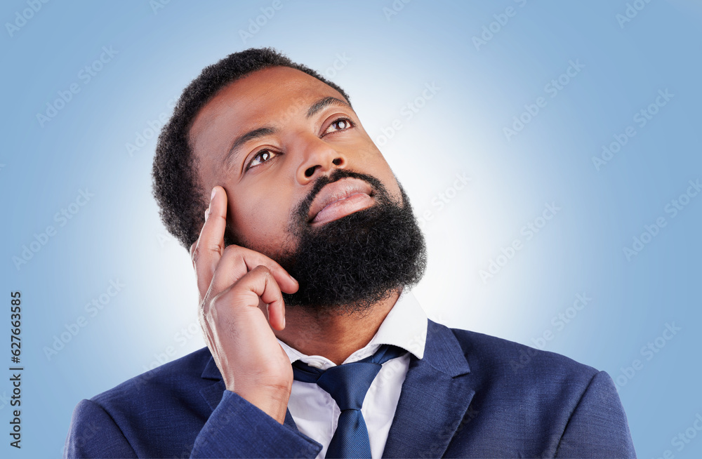 Thinking, idea and black man in studio with choice, planning or problem solving on blue background. 