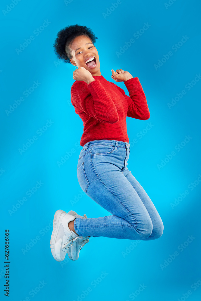 Excited, jump and woman portrait with winner, deal and smile in a studio. Wow, energy and up in the 