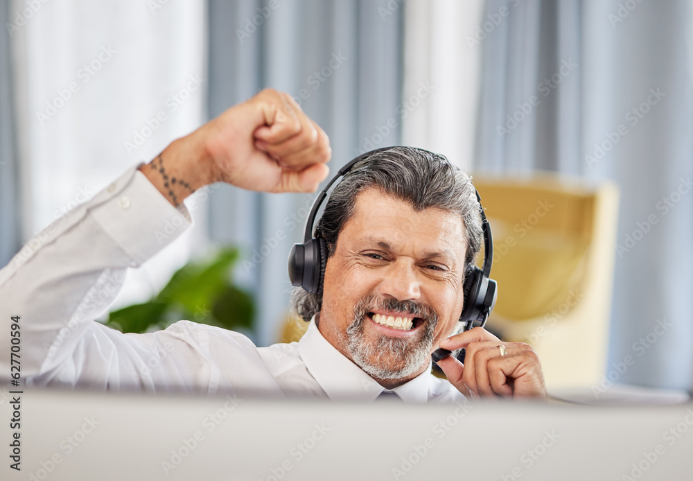 Call centre, celebrate and a happy man at a computer with success, achievement or bonus win. Mature 