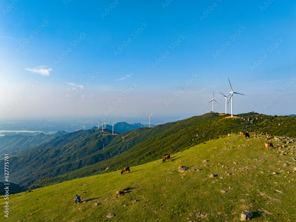 Wind farm on the mountain, blue sky and white clouds