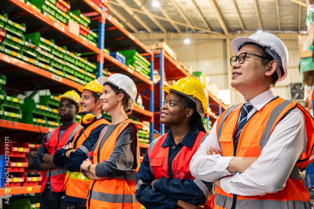 Portrait group of diverse industry worker working in factory warehouse. 