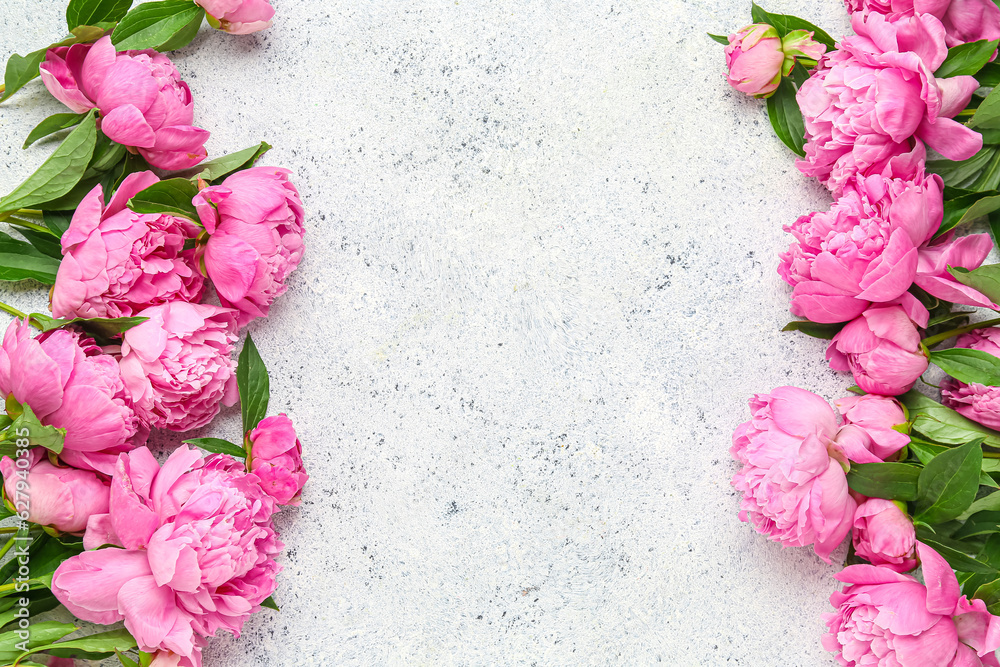 Composition with pink peony flowers on light background