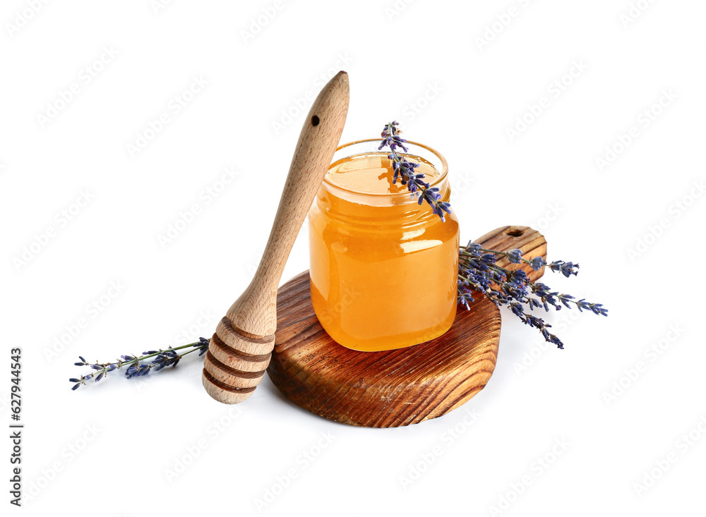 Wooden board with jar of sweet lavender honey, dipper and flowers on white background