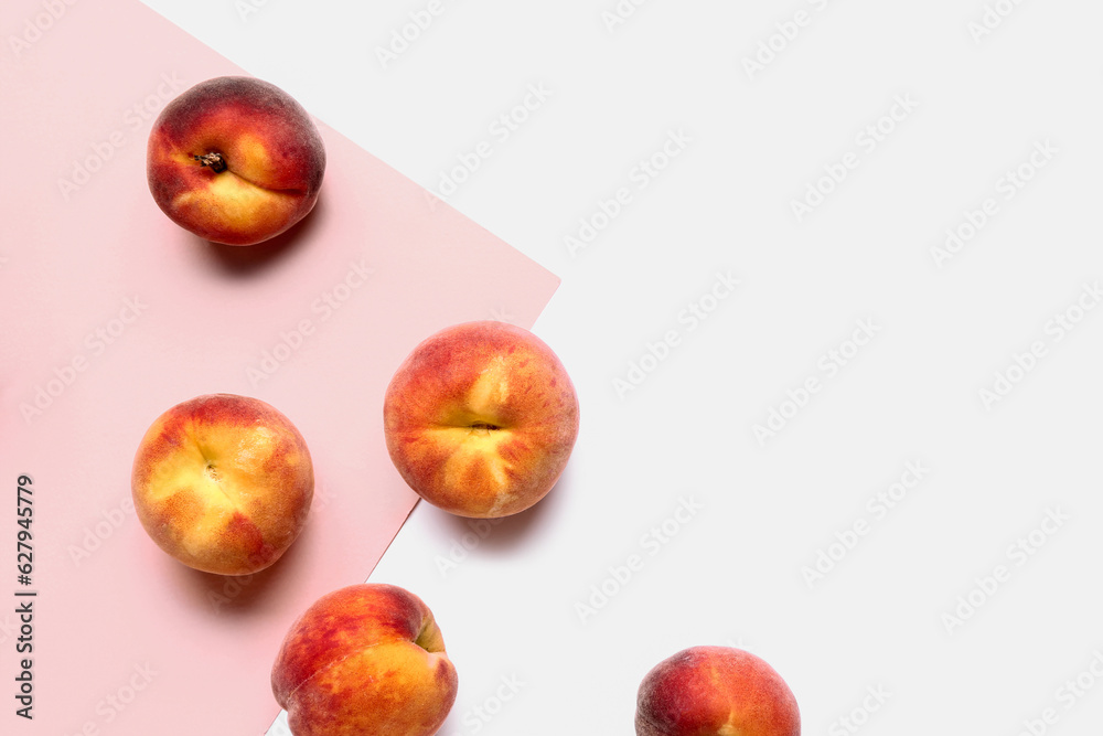 Sweet peaches on colorful background