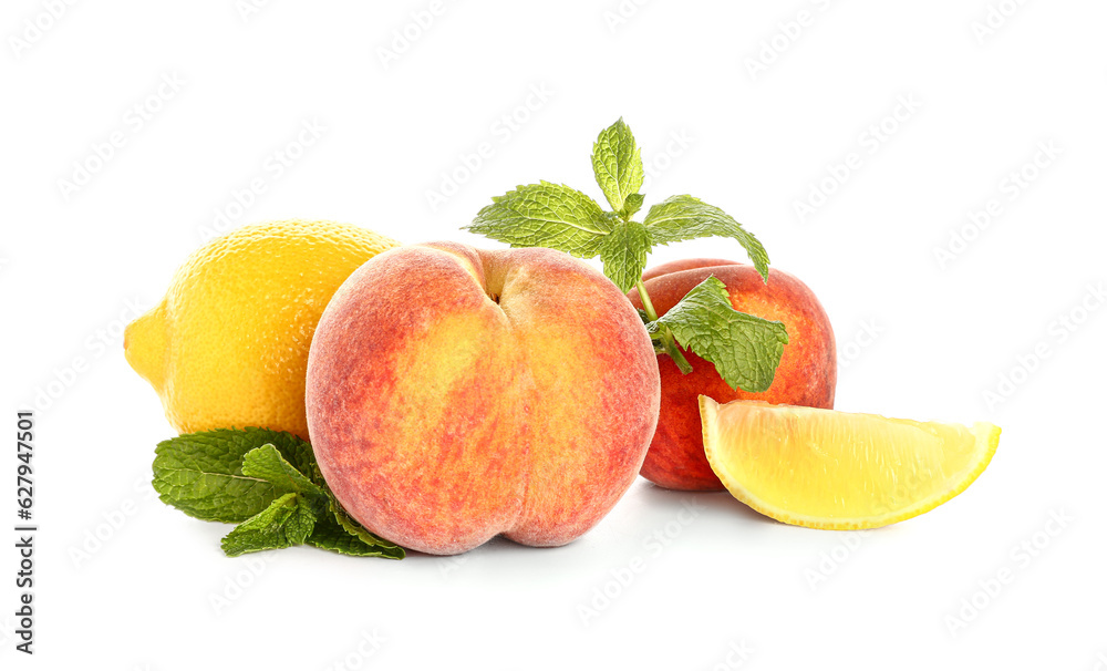 Fresh peaches, lemon and mint on white background