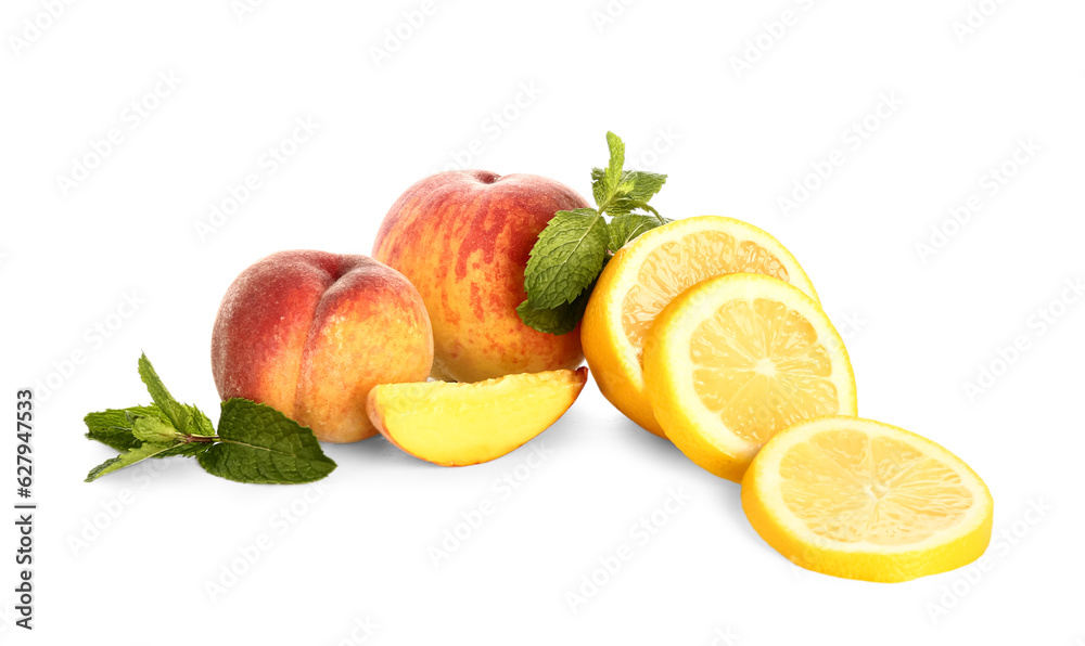 Fresh peaches, lemon and mint on white background