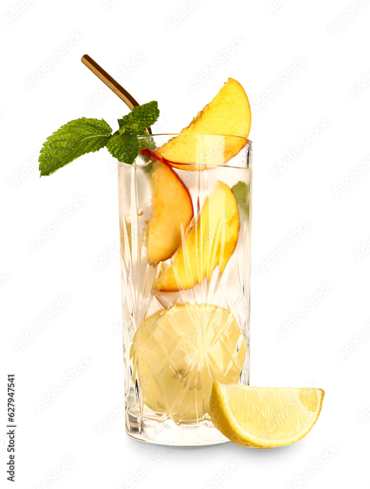 Glass of fresh peach lemonade with mint on white background