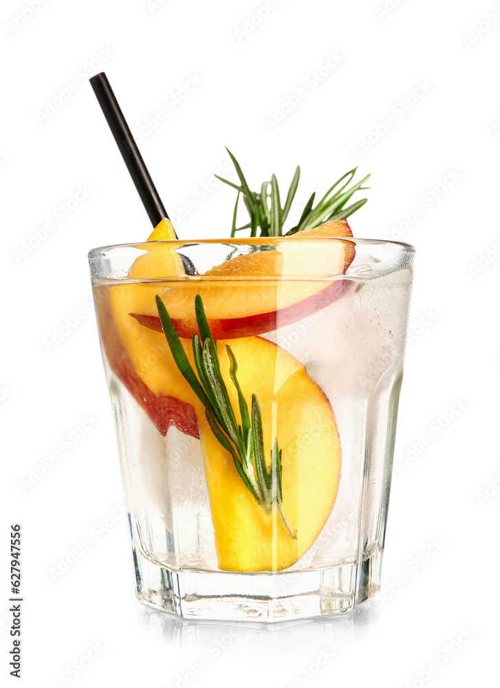 Glass of fresh peach lemonade with rosemary on white background