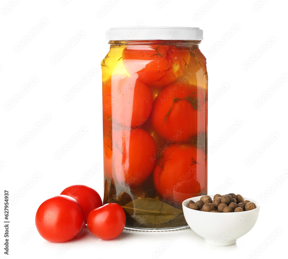 Jar with canned tomatoes and peppercorn on white background