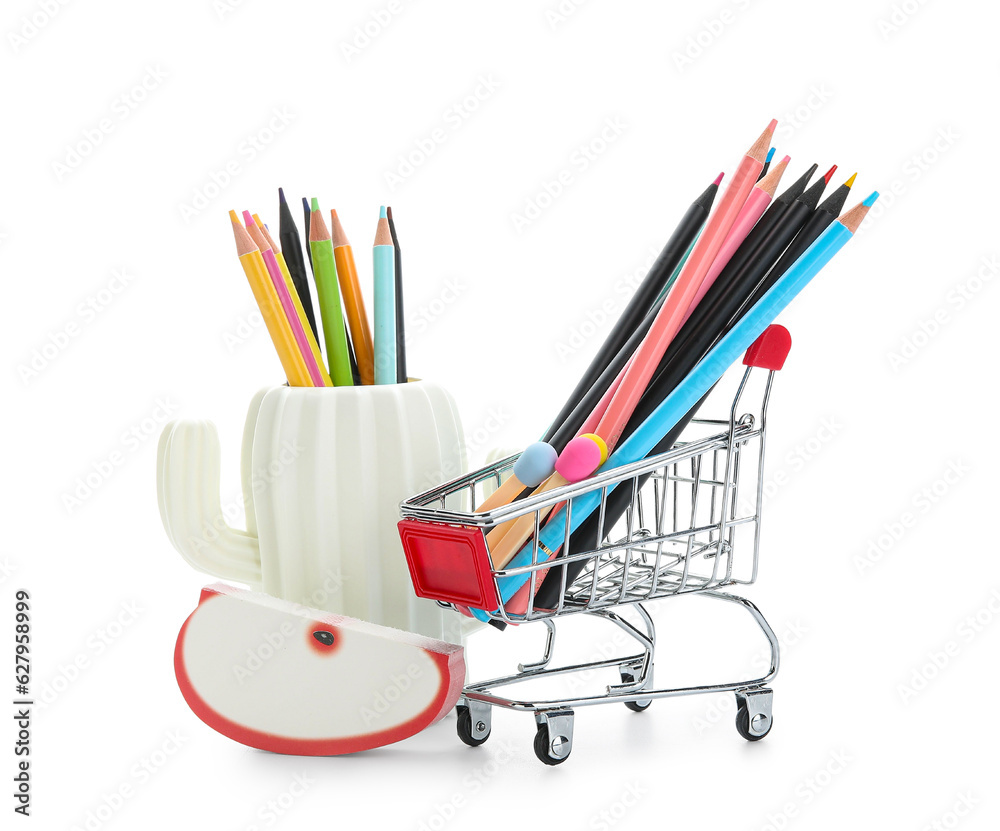 Shopping cart with school stationery on white background