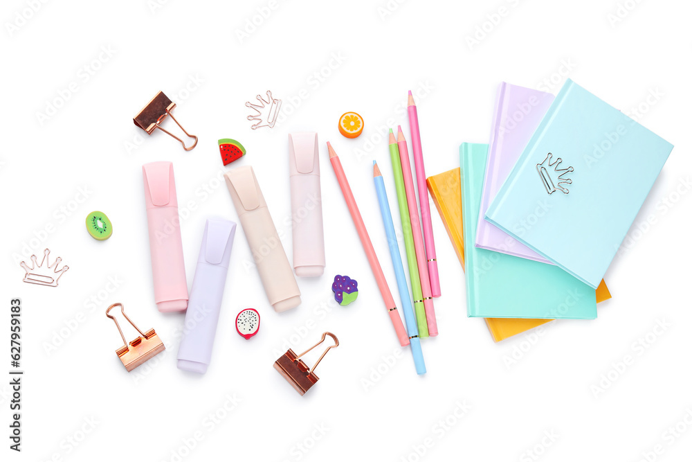 Notebooks and school stationery on white background