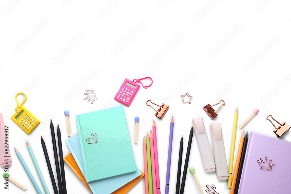 Notebooks and school stationery on white background