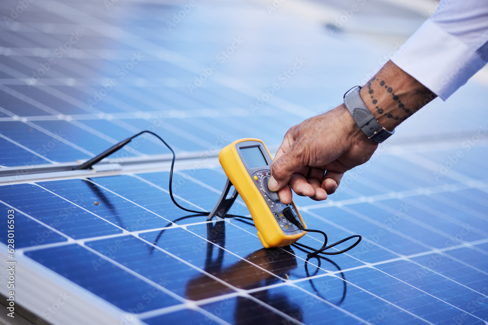 Solar panels, multimeter test and hands of technician check power, engineering and maintenance. Clos