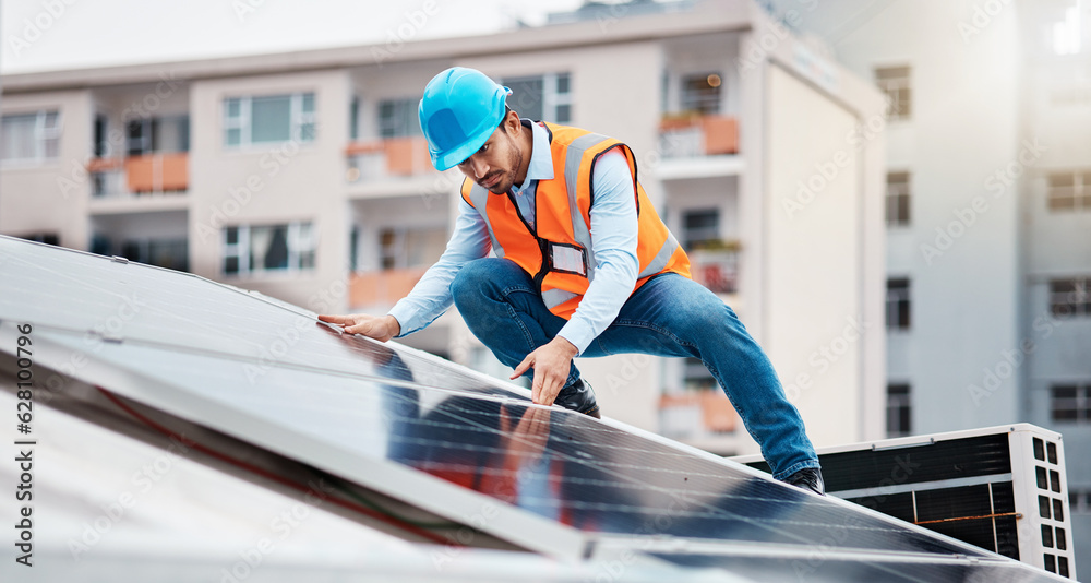 Technician man, construction and solar panel on roof for maintenance, sustainability or inspection i