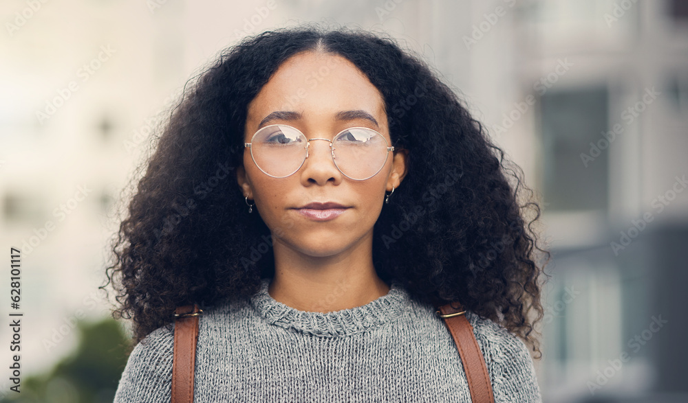 Serious, confident and portrait of a woman in the city with glasses for eye care or vision. Beautifu