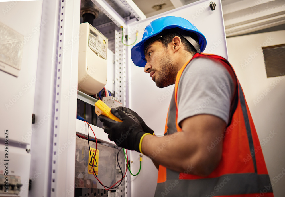 Electrician, engineering and inspection with man in control room for multimeter, mechanic and safety