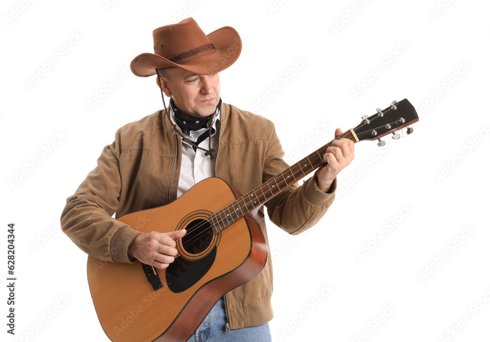 Mature cowboy playing guitar on white background