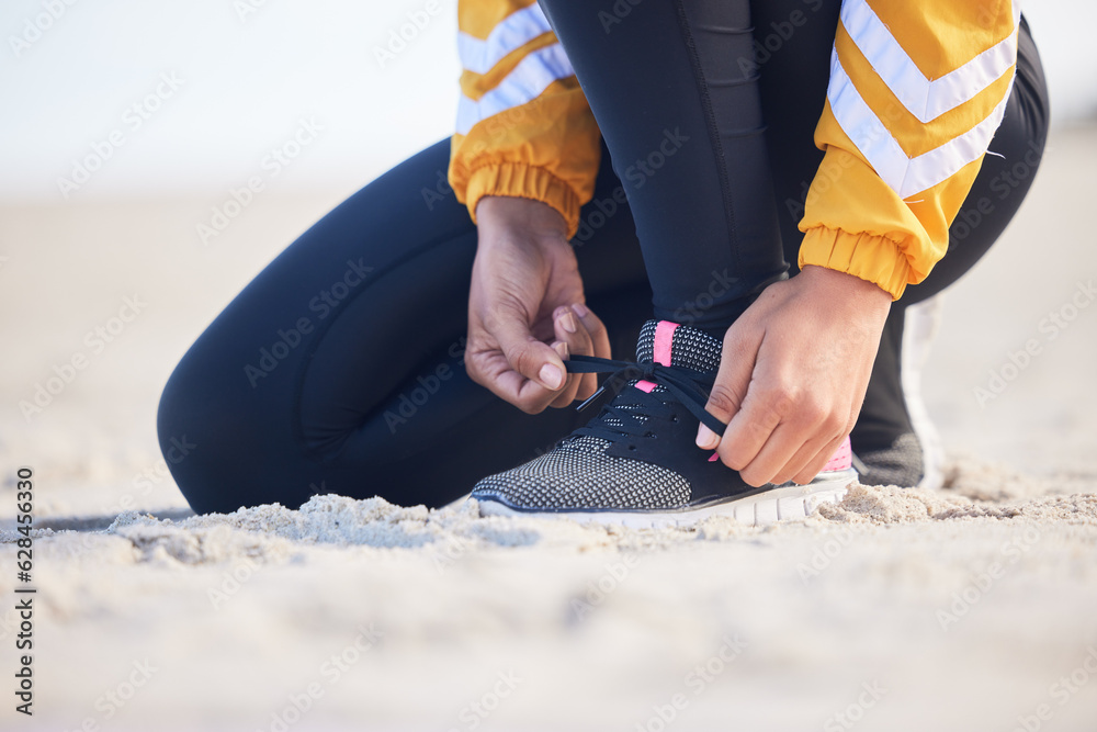 Beach, closeup and woman tie laces for an outdoor run for fitness, health and wellness by seaside. S