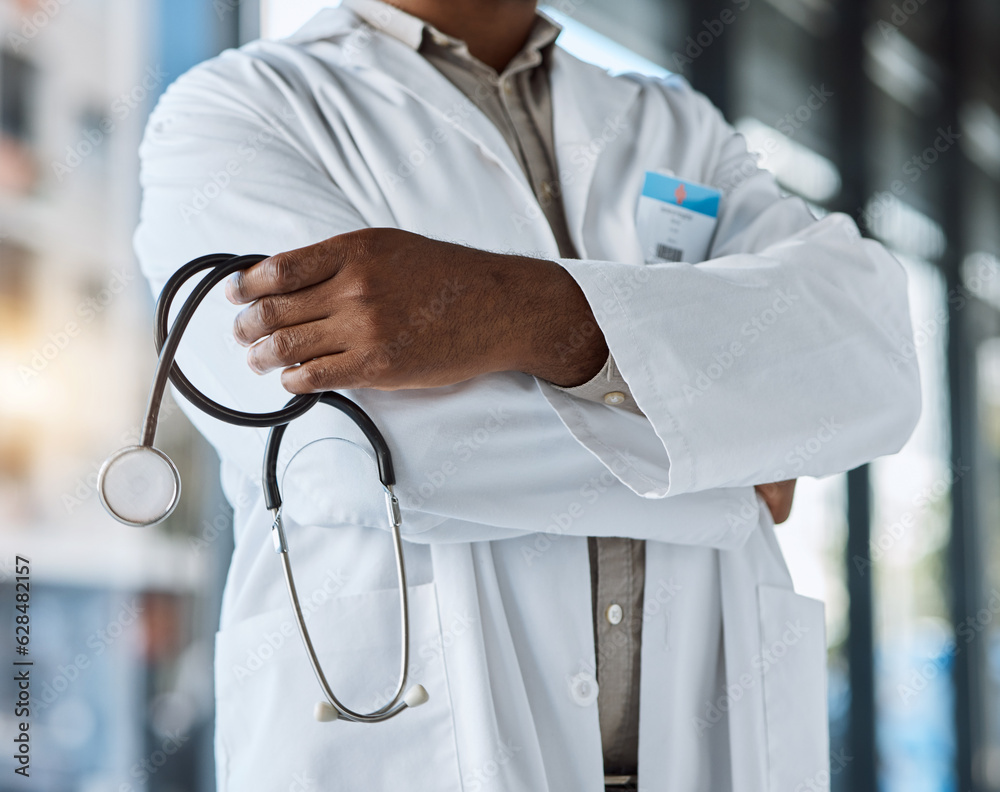 Hands of person, doctor and arms crossed with stethoscope in surgery, clinic and trust in hospital. 