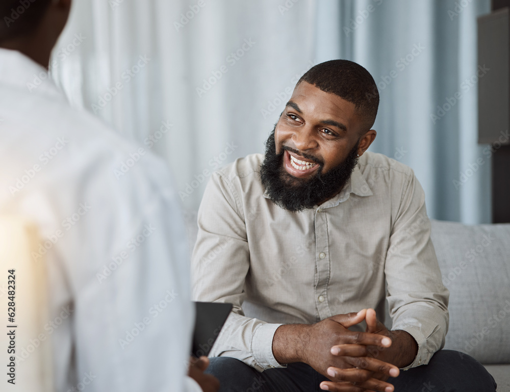 Happy black man, therapist and consultation in meeting for healthcare, mental health or therapy at t