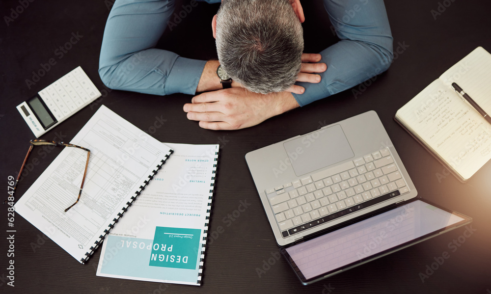 Business man, sleep and desk in top view with laptop, documents and working overtime for design prop